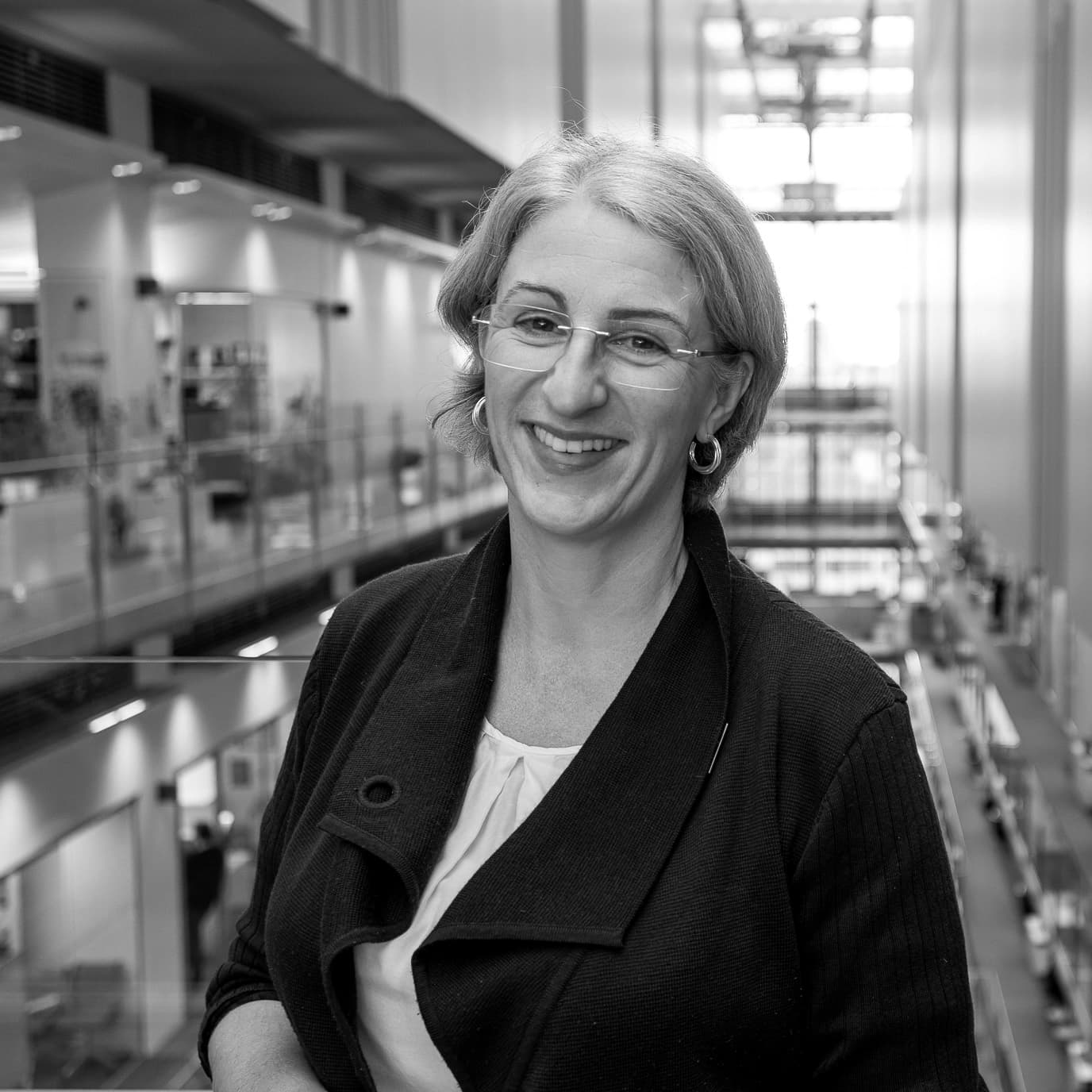 Dr Emma Wall, Senior Clinical Research Fellow at The Francis Crick Institute, smiling.