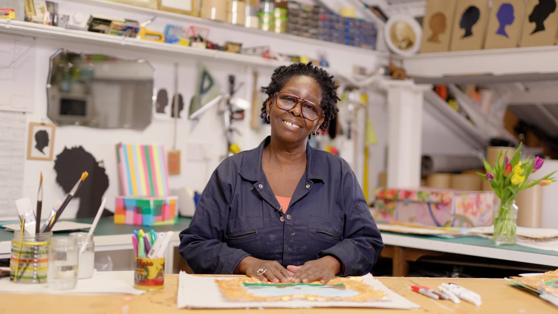 Portrait of an artist in her studio.
