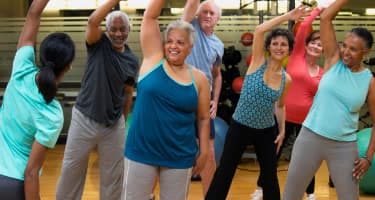 Photograph showing women stretching.