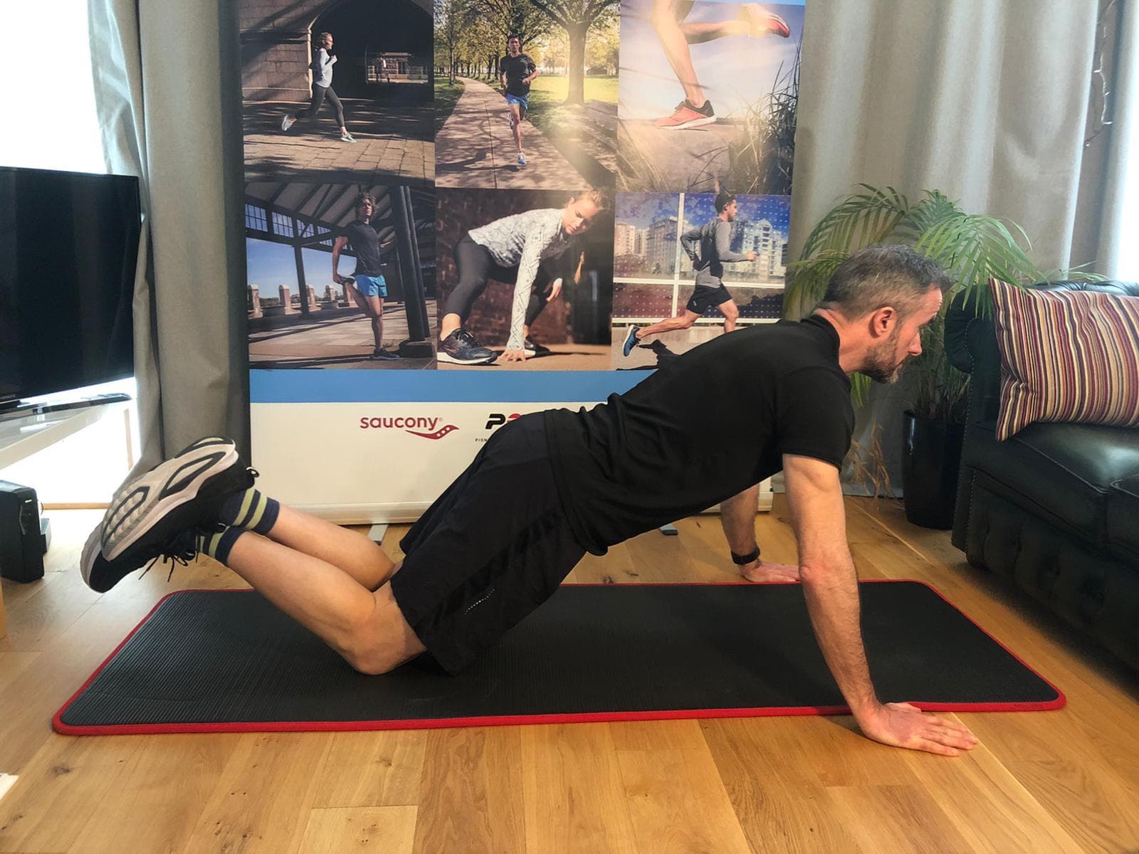 A person doing knew push-ups.