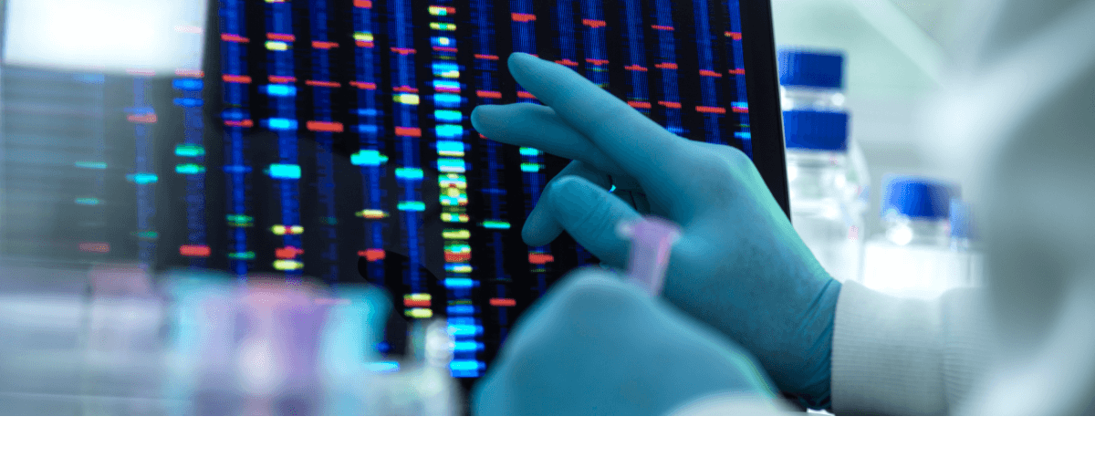 Scientist examining DNA results (genome) on a screen during an experiment in the laboratory.