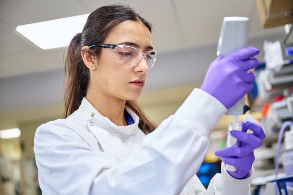 Image of a researcher working in a lab.