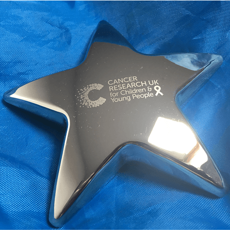 A photo of a Star Award in a blue background.