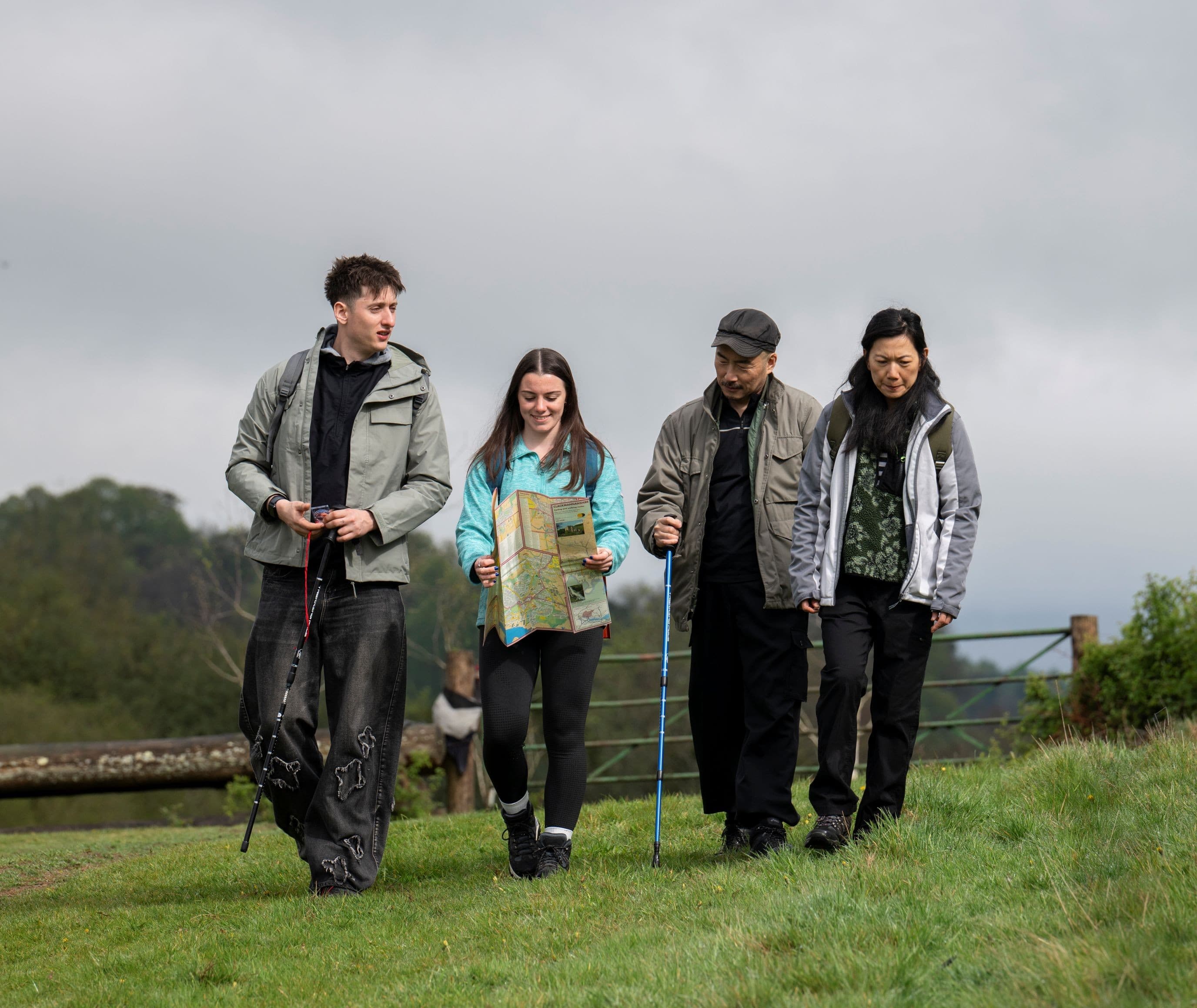 Picture of a group of people walking outside.