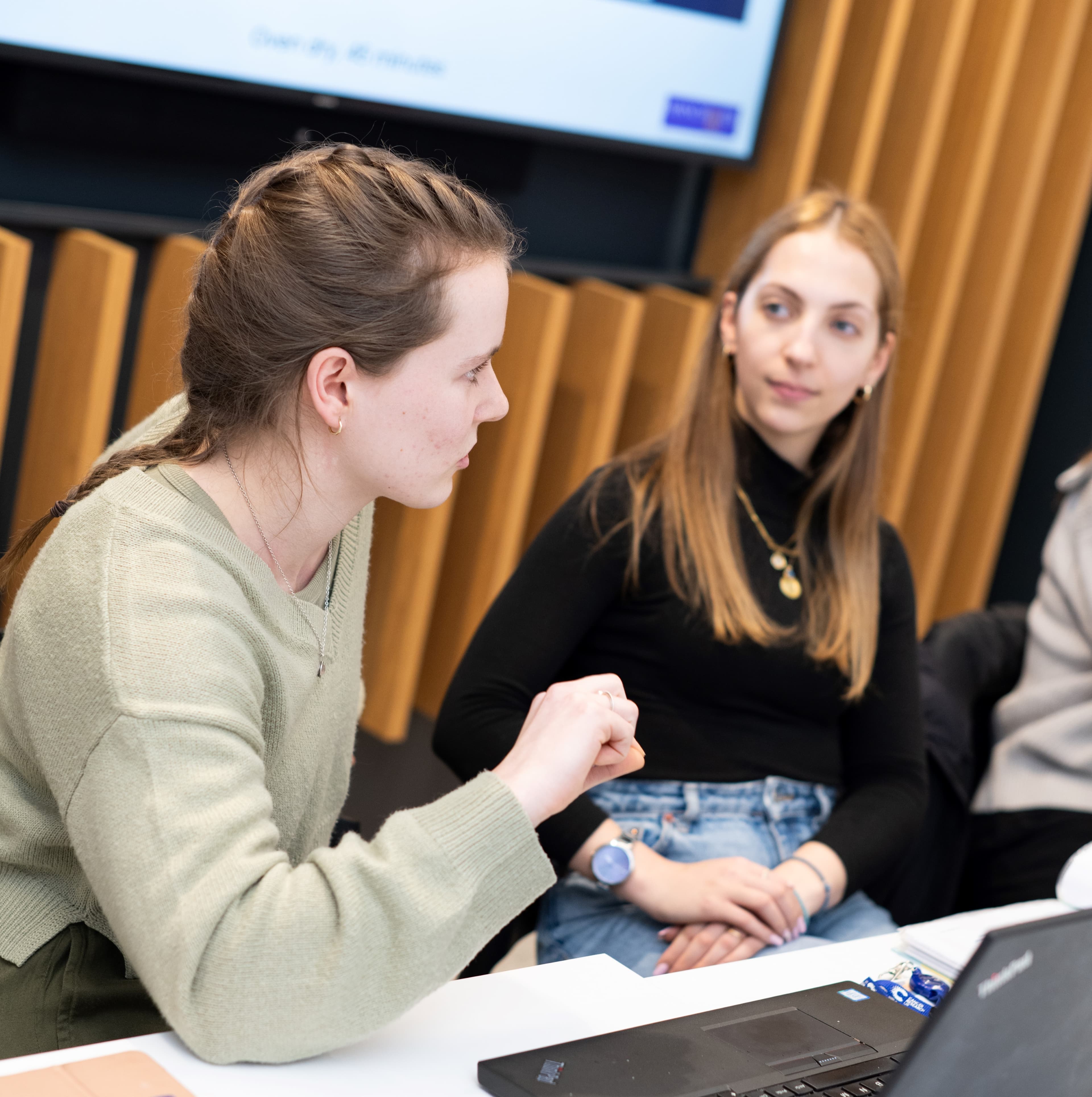Researchers engaged in group discussion.