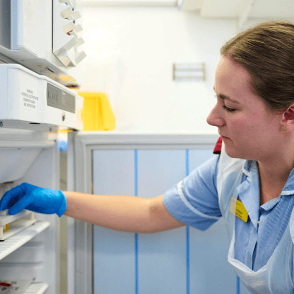 Image of a researcher holding a sample.